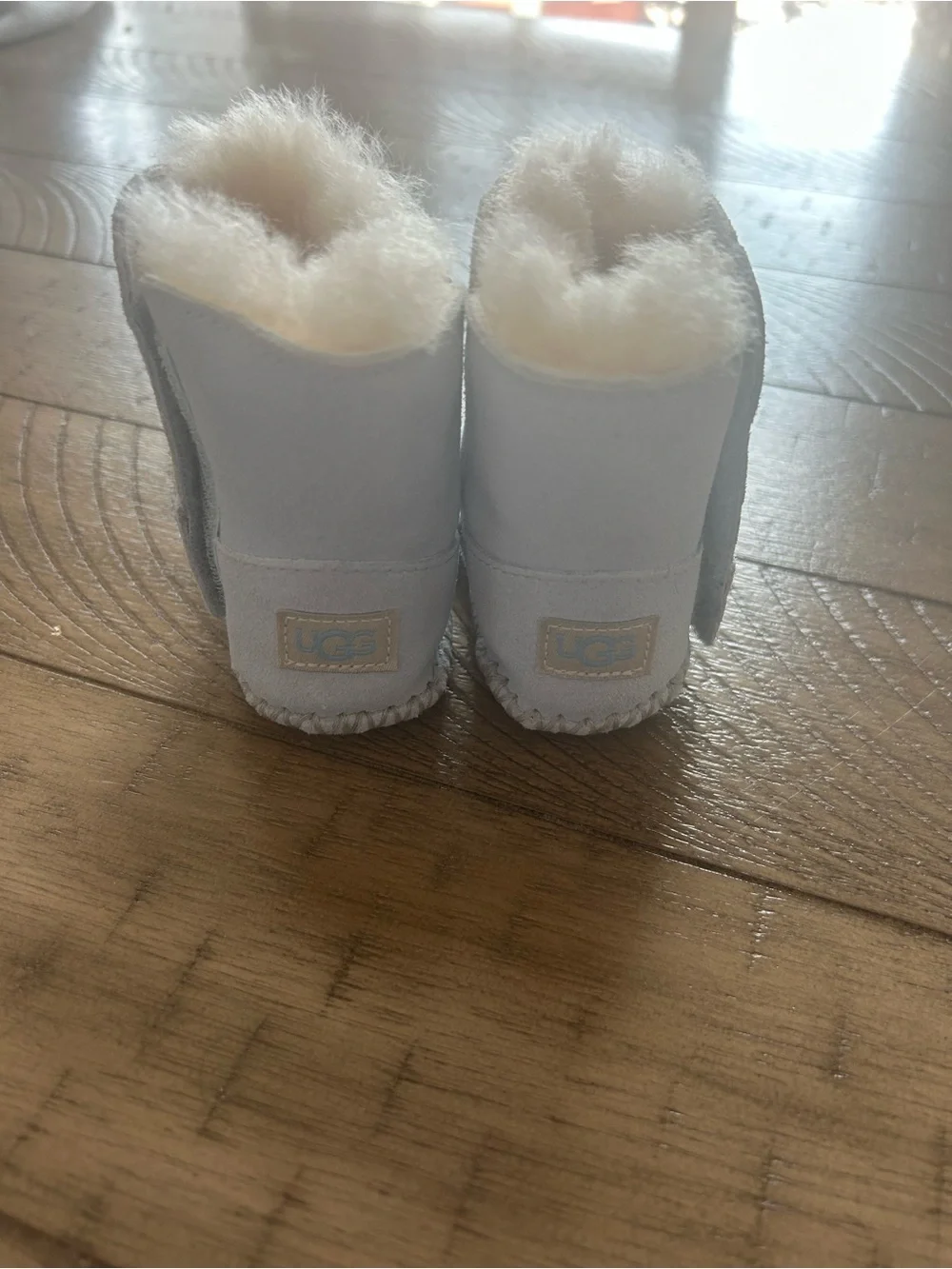 Size 0/1 UGG Baby Girl Soft Booties in Light blue